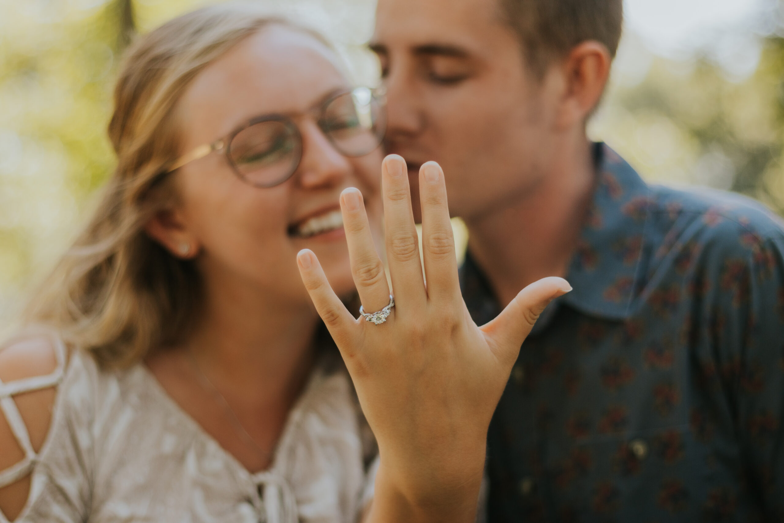 Girl showing off her new engagement ring right after her proposal!